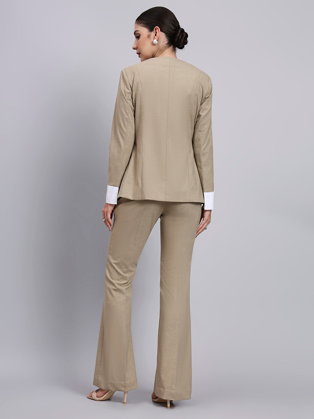 Beige Stretch Power Suit with refined linear detailing