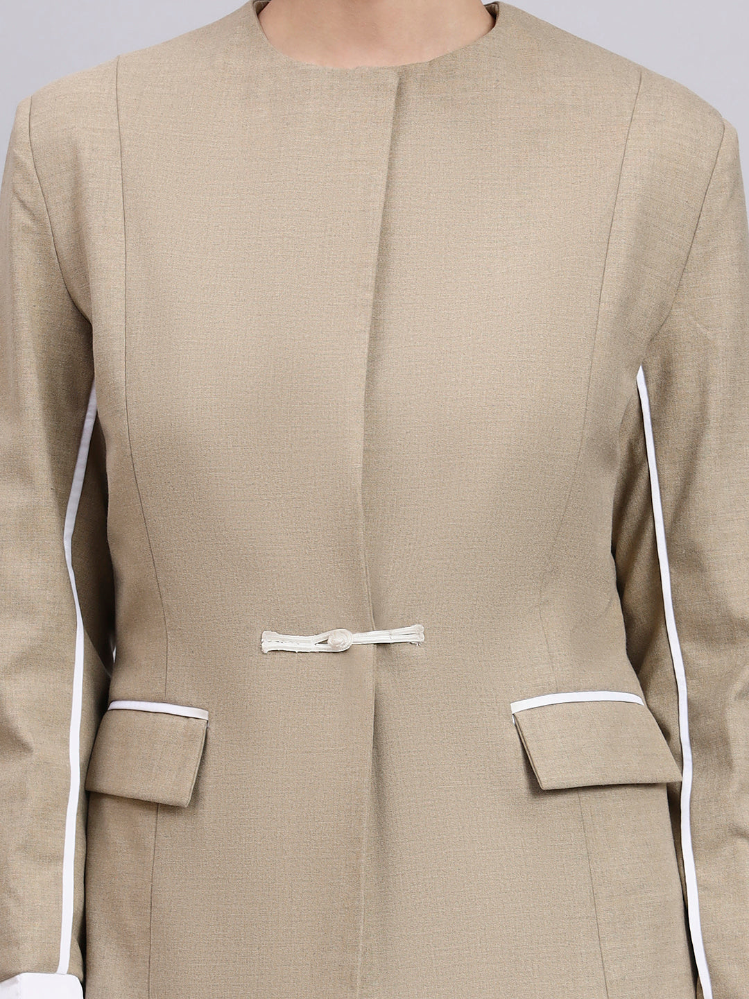 Beige Stretch Power Suit with refined linear detailing