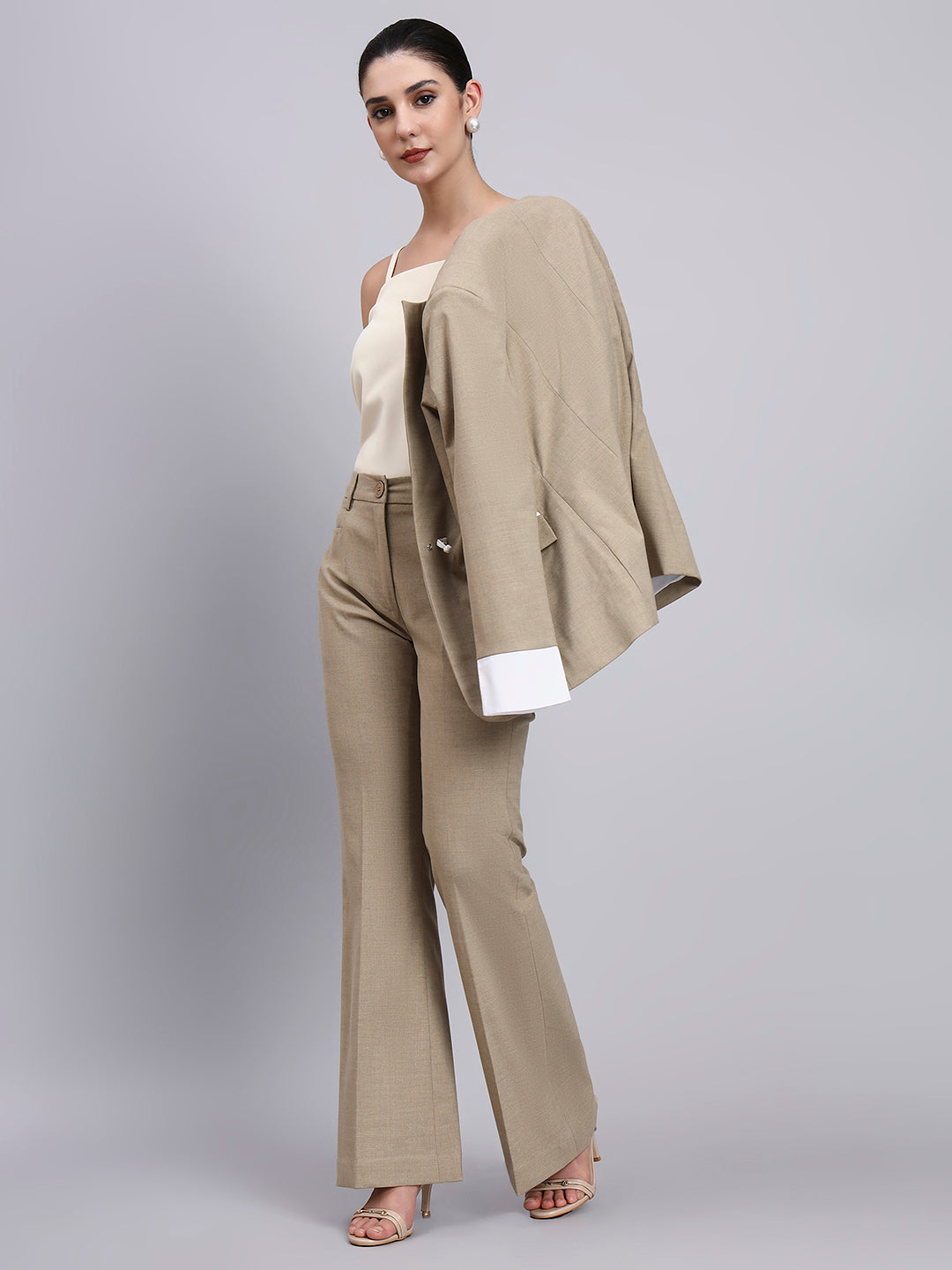 Beige Stretch Power Suit with refined linear detailing