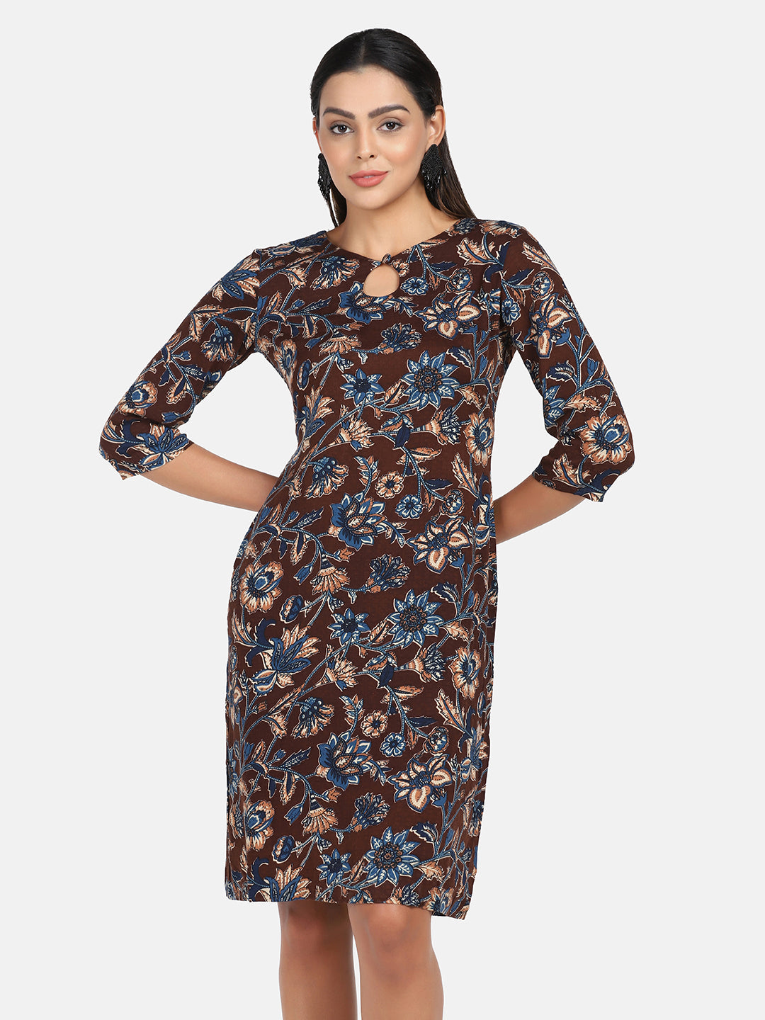 Floral print cotton dress in brown and blue colors.