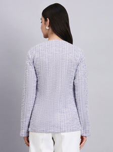 Elegant lilac warm tweed Stretchable top with pearl button detailing and a sleek front-slit silhouette.